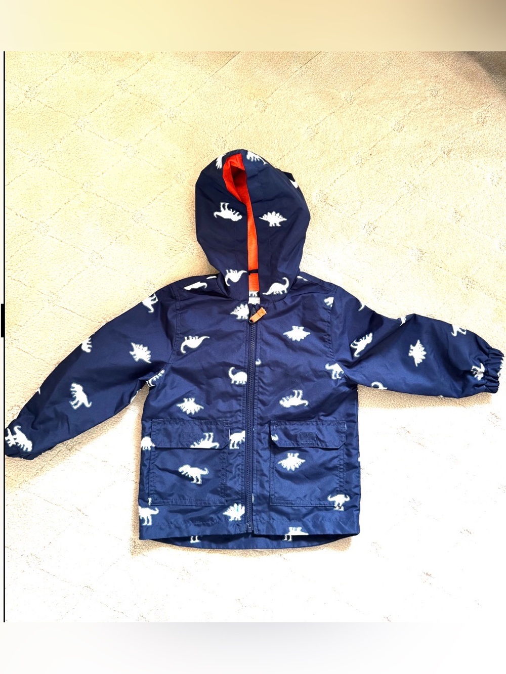 Carters Kids' Navy Dino Hooded Rain Jacket. Dinos change colors when wet!